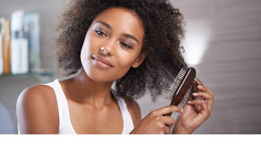 How to Brush Curly Hair Without Disrupting Your Curls